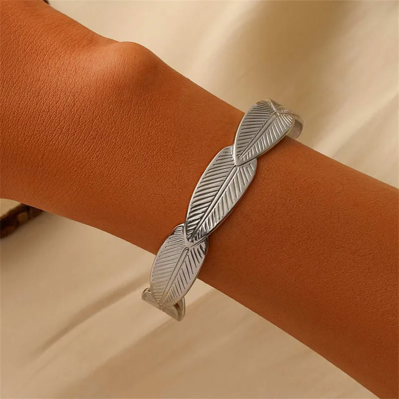 Silvertone Linked Feather Cuff made by Zulily