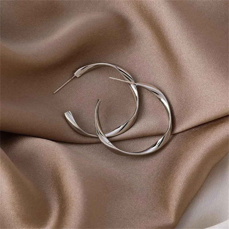 Silvertone Twist Open Hoop Earrings made by Zulily