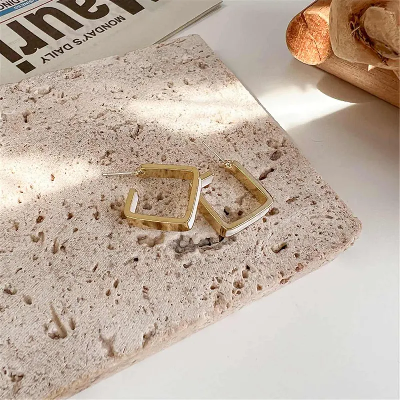 White Enamel & Goldtone Open Square Huggie Earring made by Zulily