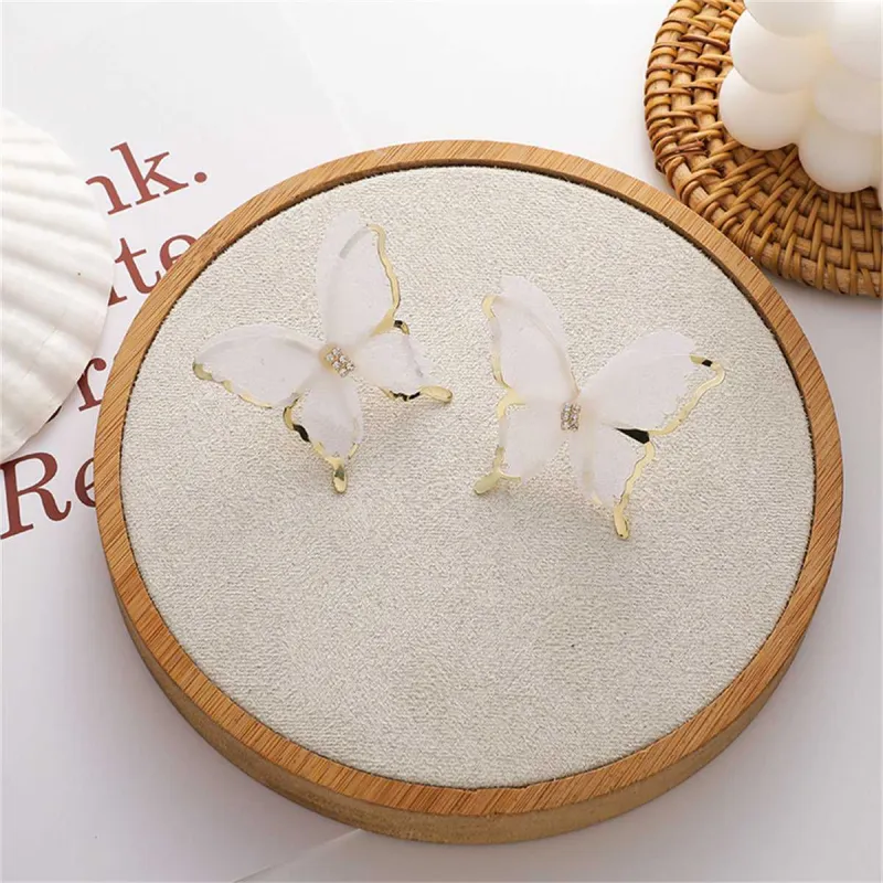 White Mesh & Goldtone Butterfly Stud Earrings made by Zulily