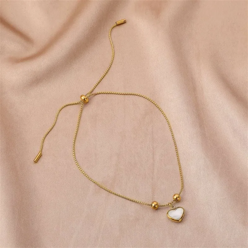 White Shell & Goldtone Heart Charm Adjustable Bracelet made by Zulily