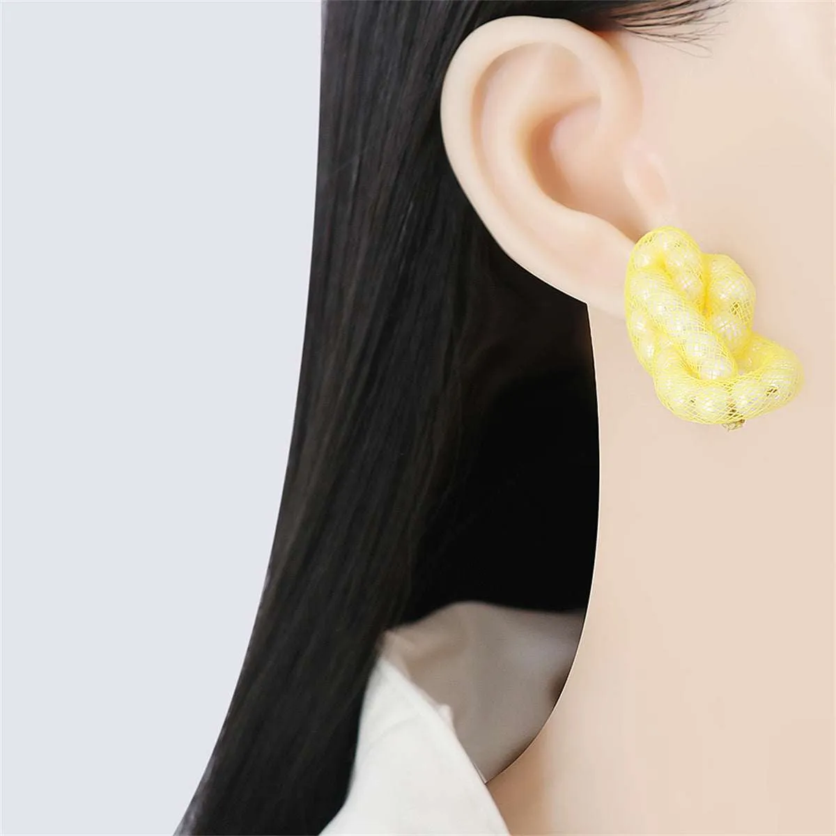 Yellow Pearl Knot Stud Earrings sold by Zulily