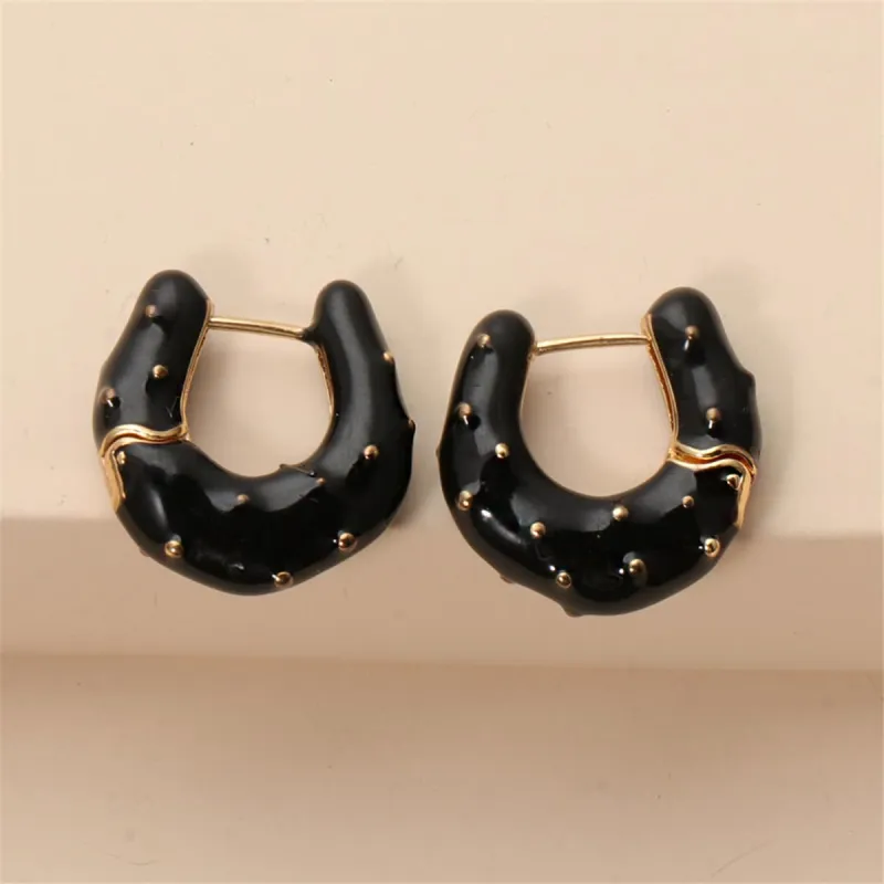 Black Enamel & Goldtone Huggie Earrings made by Zulily