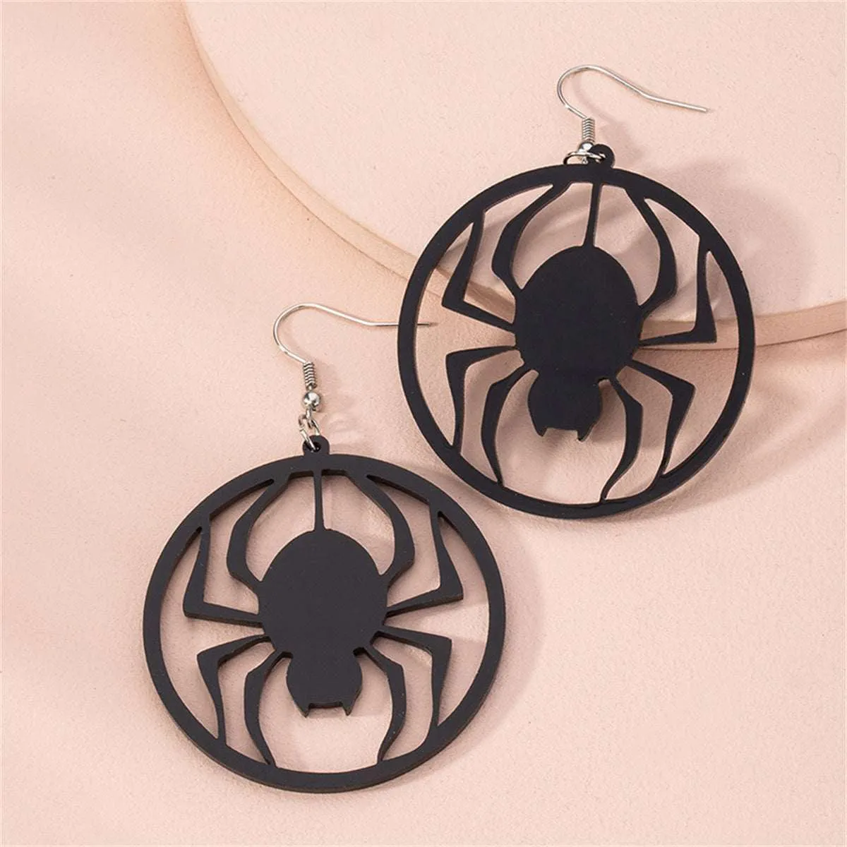 Black Acrylic Spider Silhouette Drop Earrings sold by Zulily