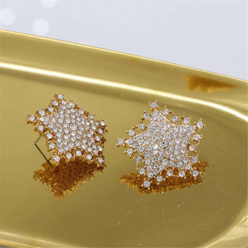 Cubic Zirconia & Goldtone Petite Star Stud Earrings made by Zulily
