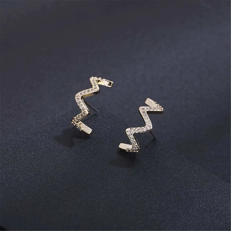 Cubic Zirconia & Goldtone Wave Stud Earrings made by Zulily