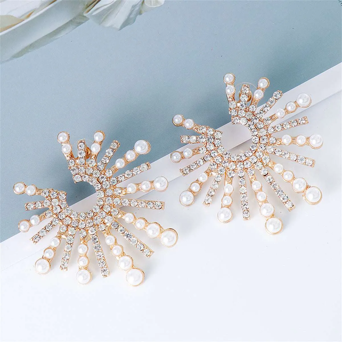 Cubic Zirconia & Pearl Goldtone Sun Stud Earrings sold by Zulily