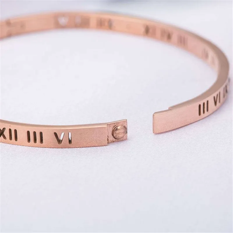 Cubic Zirconia & Rose Goldtone Roman Numeral Bangle made by Zulily
