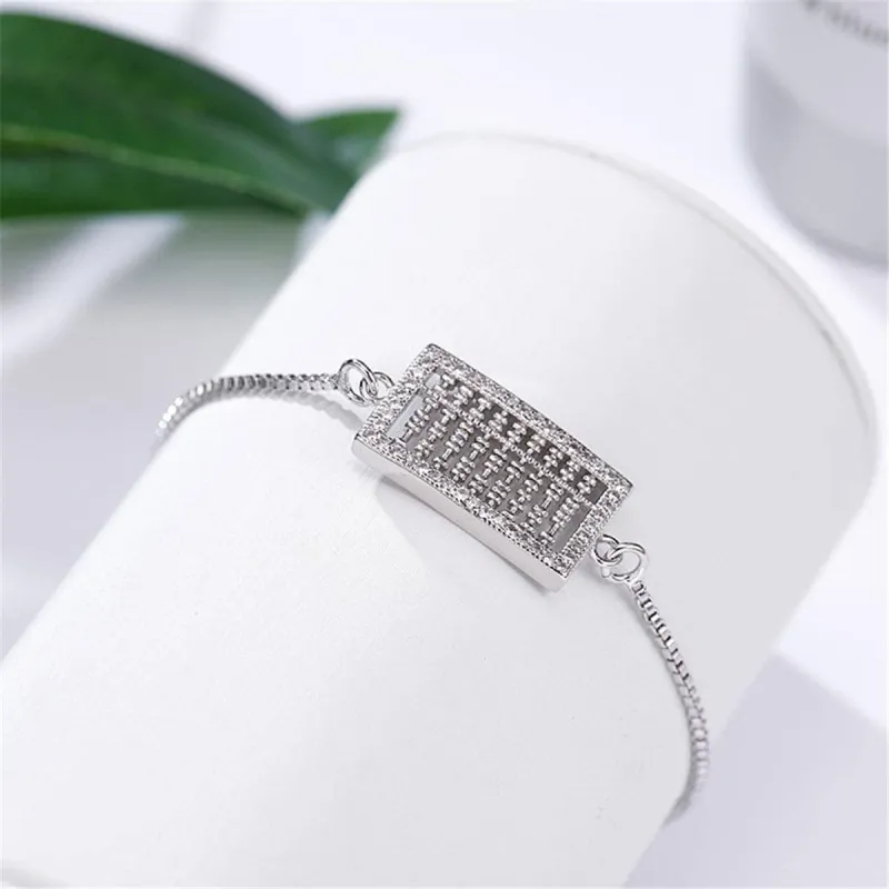 Cubic Zirconia & Silvertone Abacus Charm Adjustable Bracelet made by Zulily