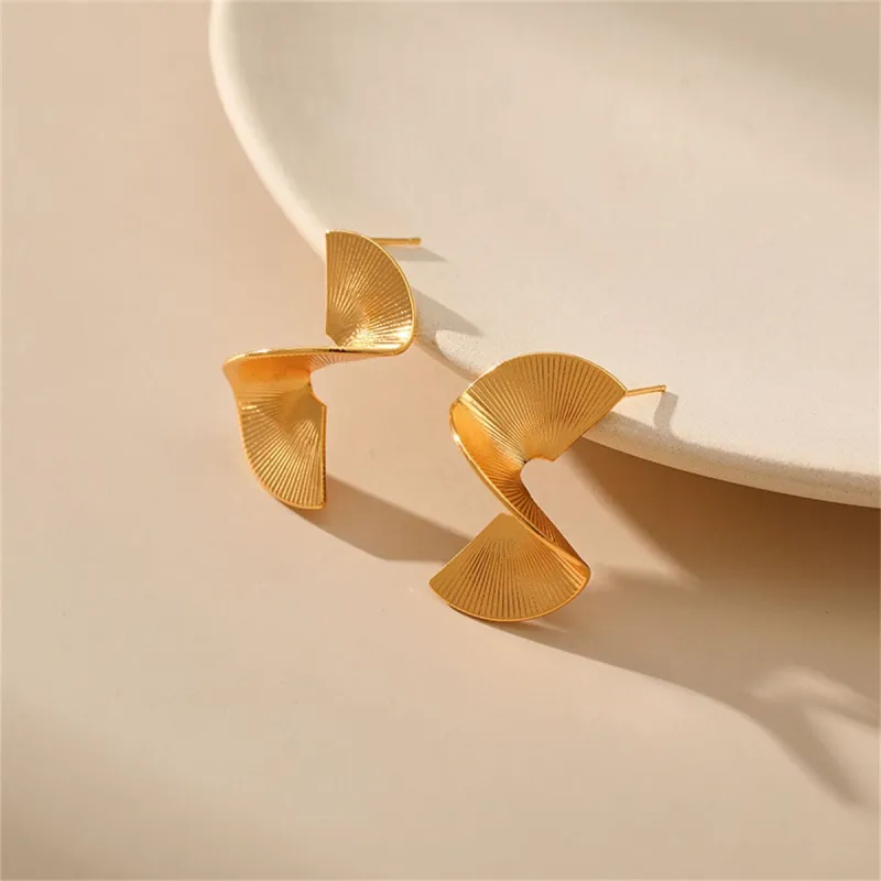 Goldtone 3D Spinning Stud Earrings made by Zulily