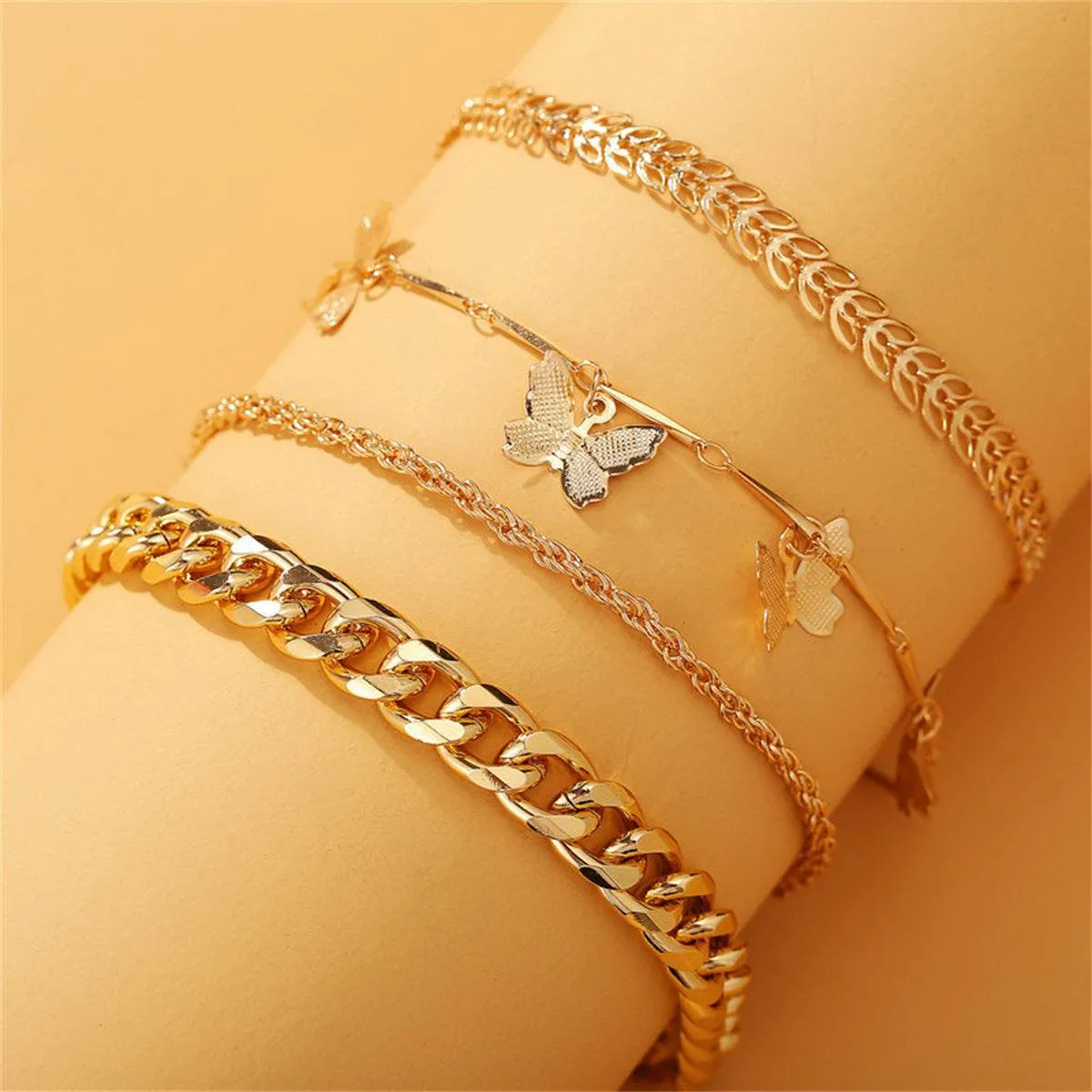 Goldtone Butterfly Station Bracelet Set sold by Zulily