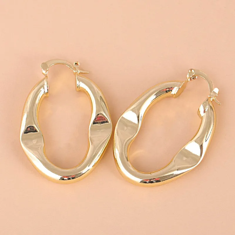 Goldtone Indented Hoop Earrings made by Zulily