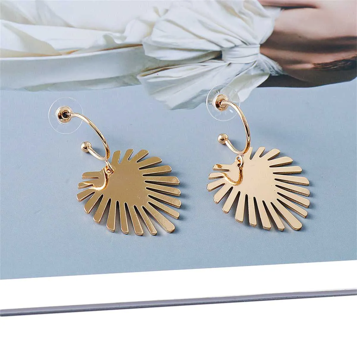 Goldtone Palm Leaf Drop Earrings sold by Zulily