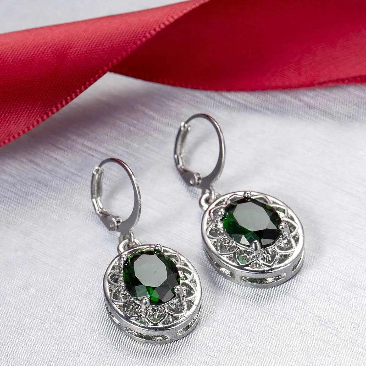 Green Crystal & Silvertone Floral Drop Earrings sold by Zulily