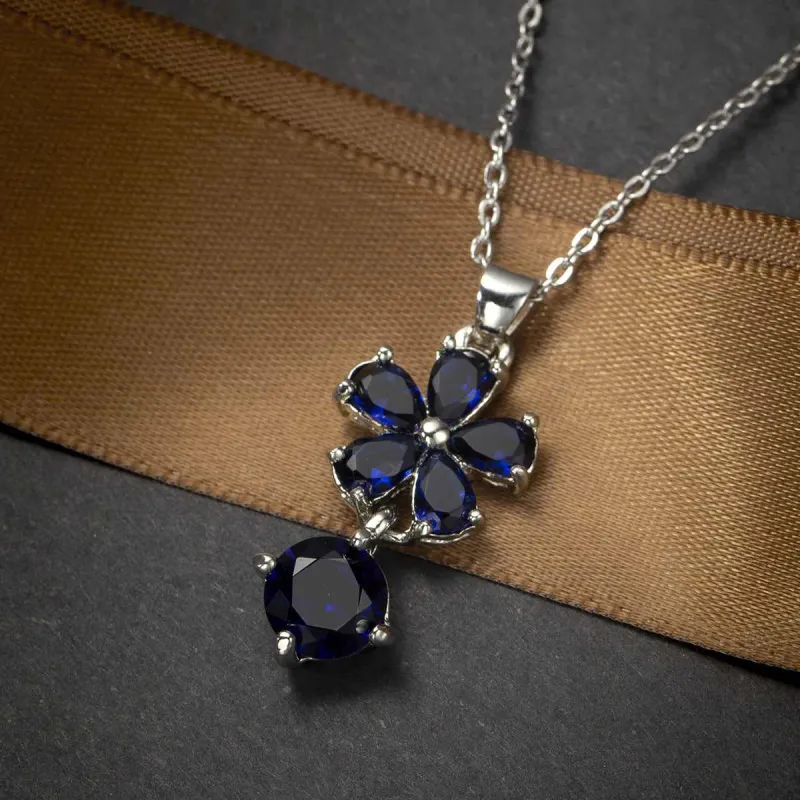 Navy Crystal & Silvertone Floral Pendant Necklace made by Zulily