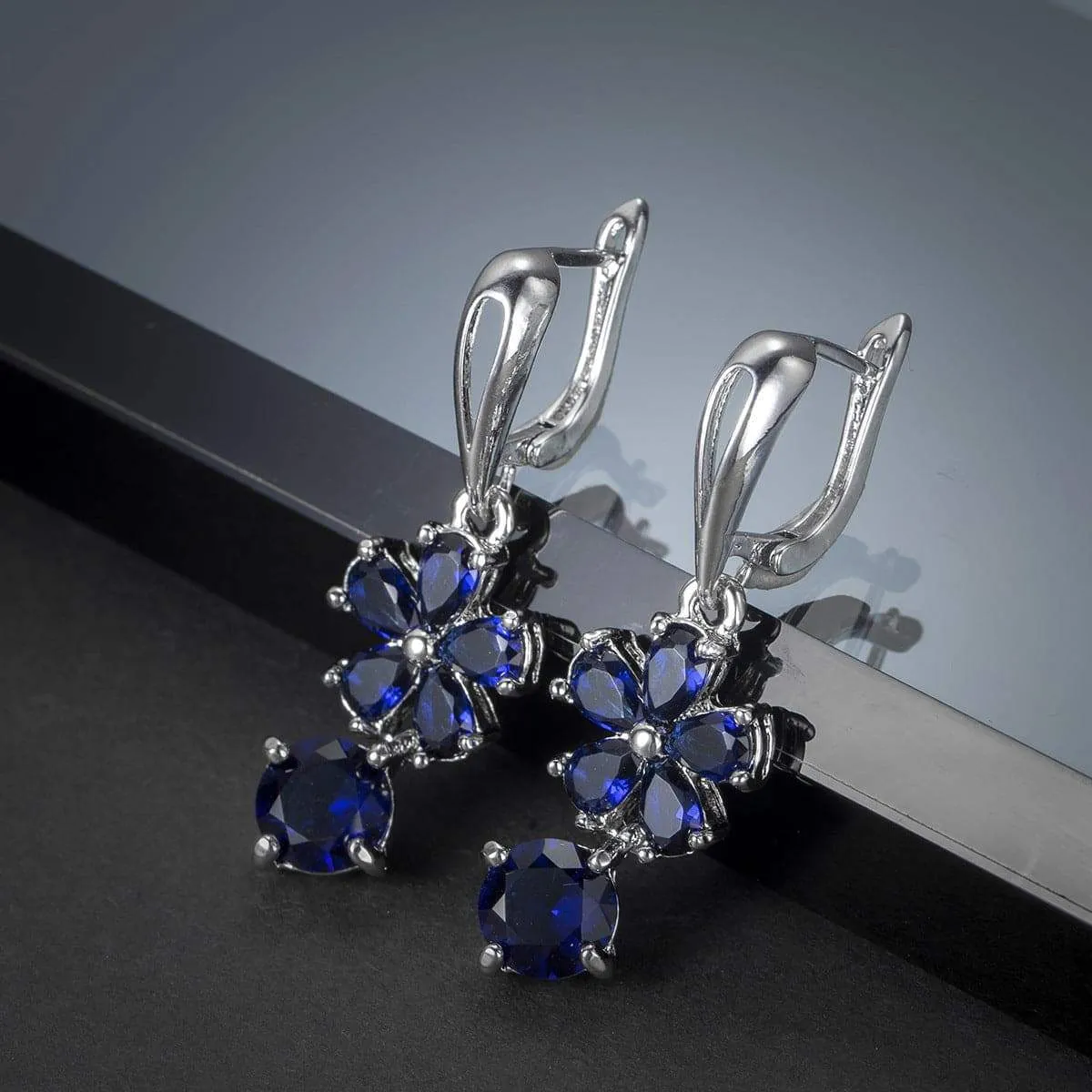 Navy Crystal Floral Drop Earrings sold by Zulily