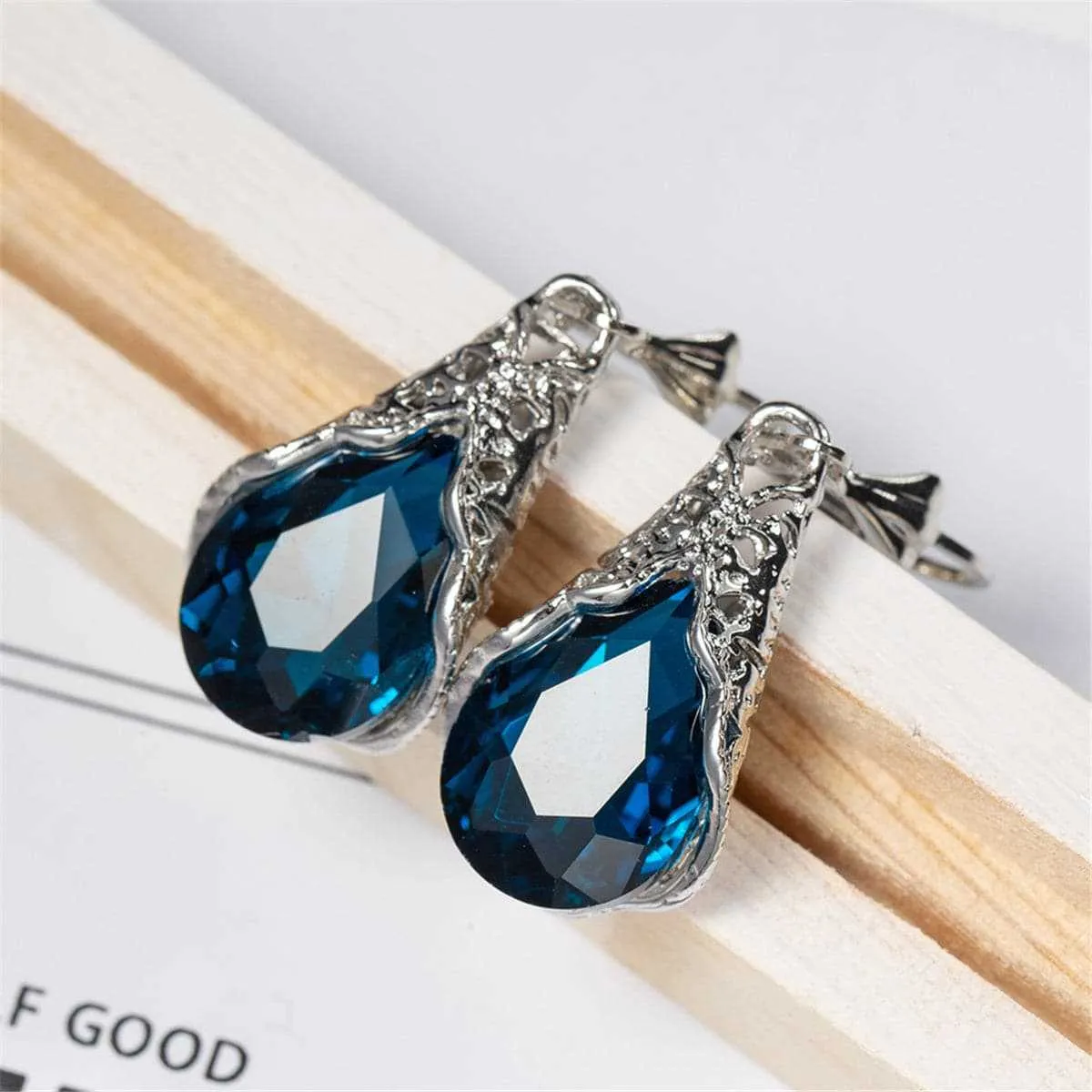 Navy Crystal Drop Earrings sold by Zulily