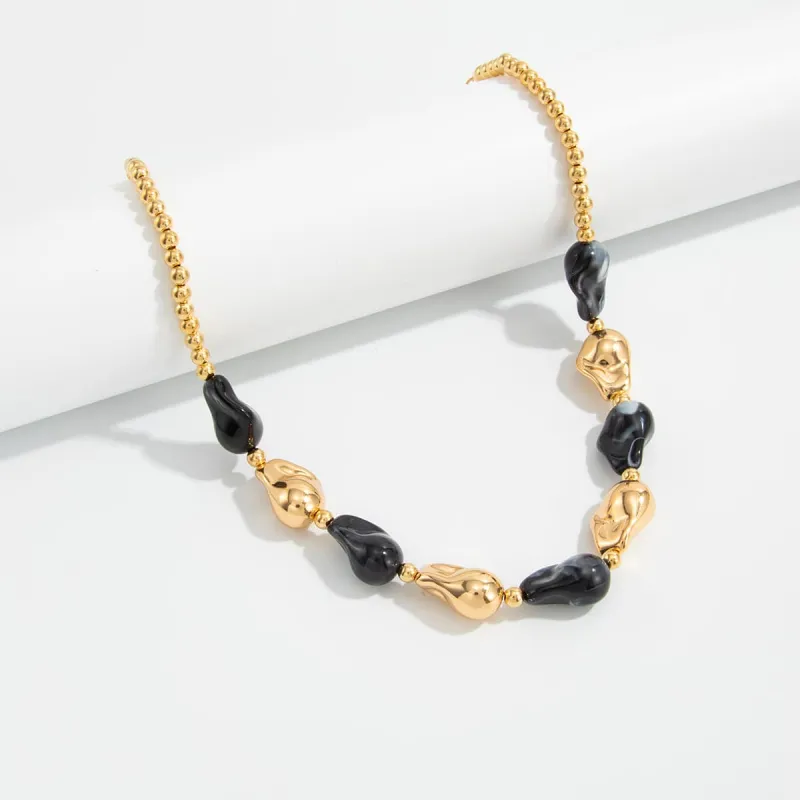 Black Resin & Goldtone Irregular Drop Station Collar Necklace made by Zulily