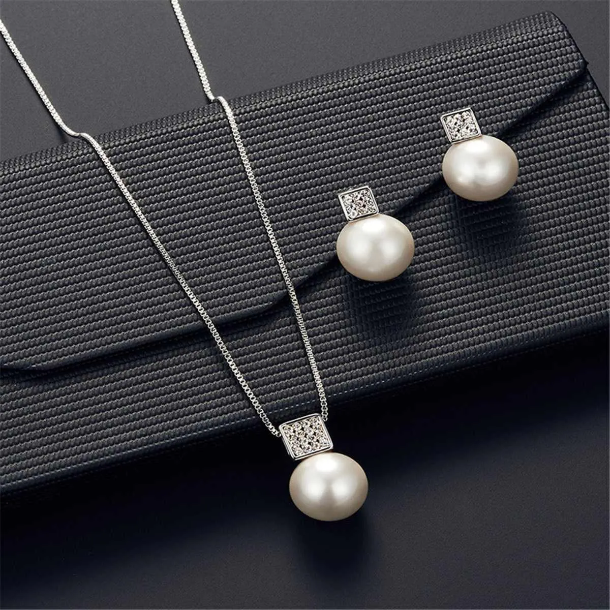 Pearl & Silvertone Pendant Necklace & Drop Earrings sold by Zulily