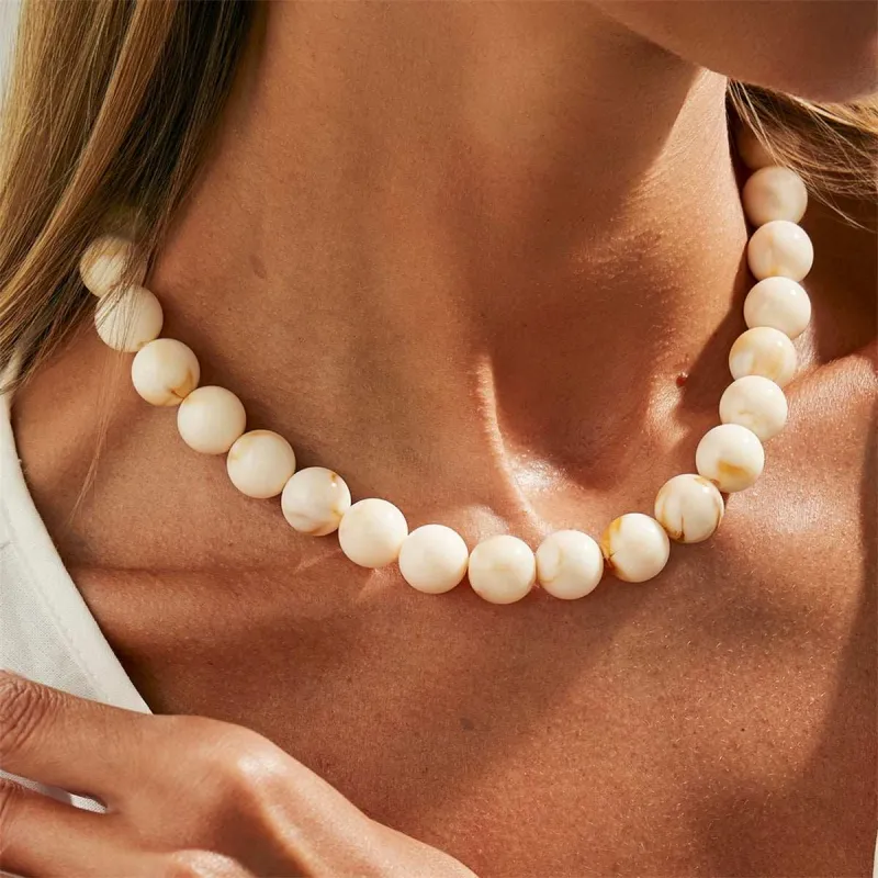 Beige Resin & Silvertone Beaded Collar Necklace made by Zulily