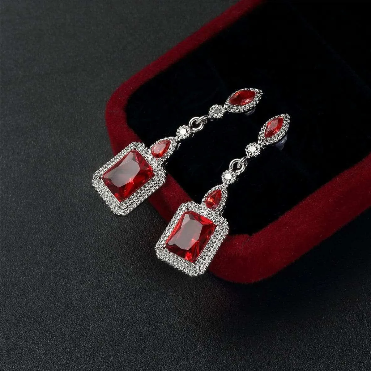 Red Crystal & Silvertone Square Drop Earrings sold by Zulily