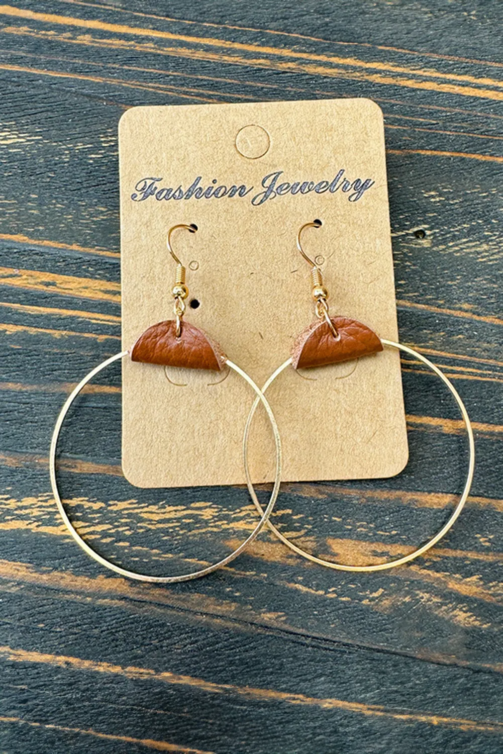 Gold Leather Hoop Earrings sold by Zulily