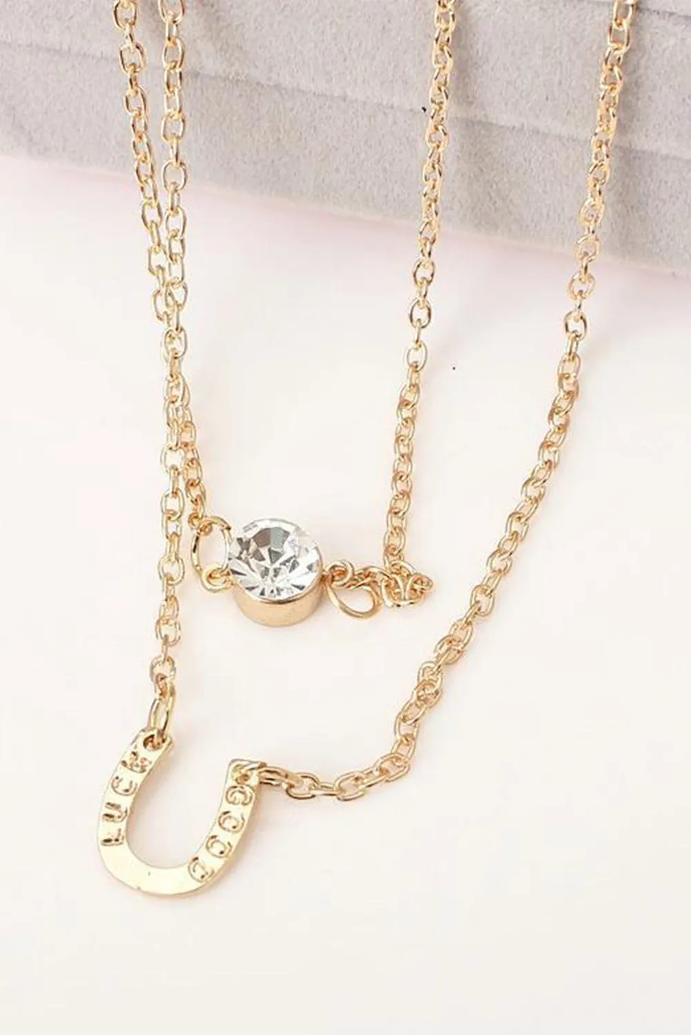 Gold Horseshoe Layered Chopped Necklace sold by Zulily product image thumbnail 2