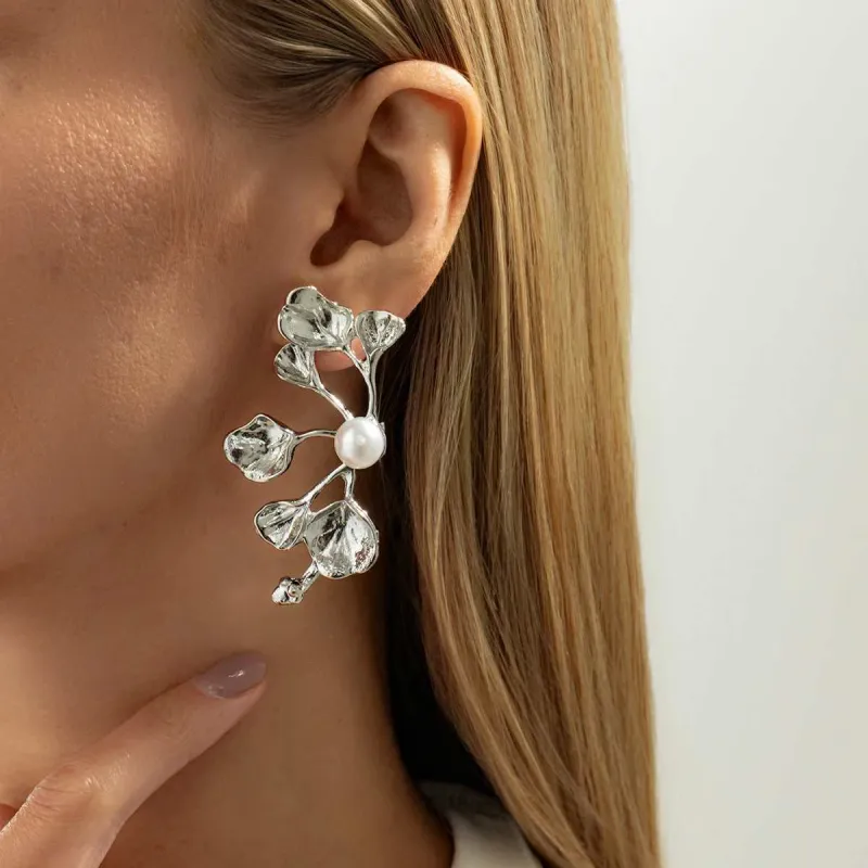 Pearl & Silvertone Plum Blossom Stud Earrings made by Zulily