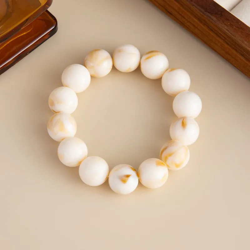 Beige Resin Beaded Stretch Bracelet made by Zulily