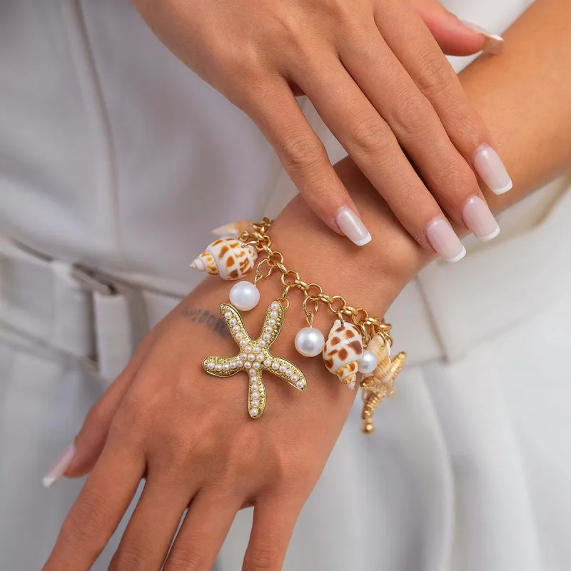 Conch Shell & Pearl Goldtone Starfish Charm Bracelet made by Zulily