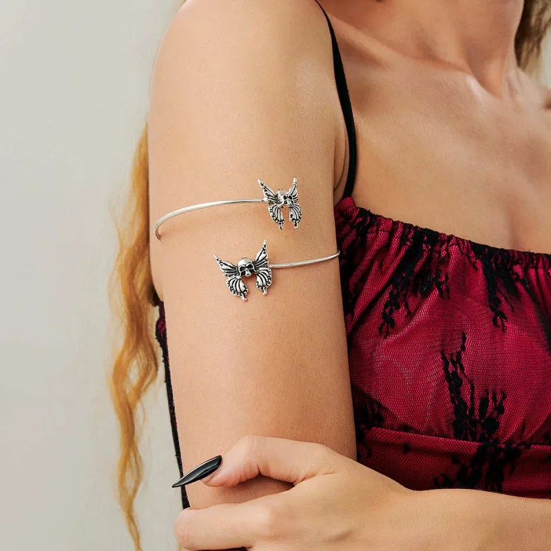 Silvertone Dual-Skull-Butterflies Bypass Arm Cuff made by Zulily