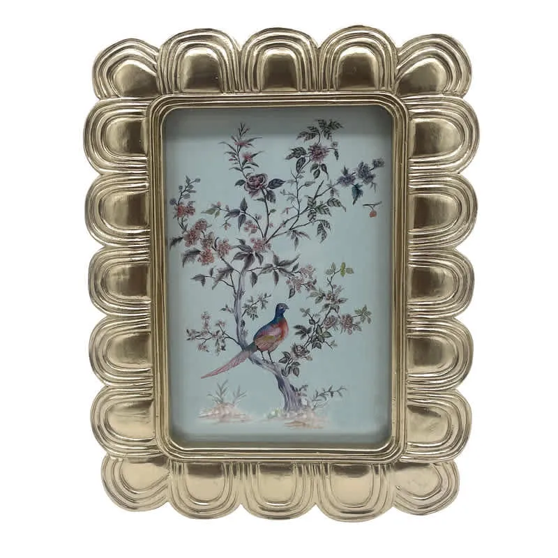 Gold Scalloped Picture Frame sold by Zulily