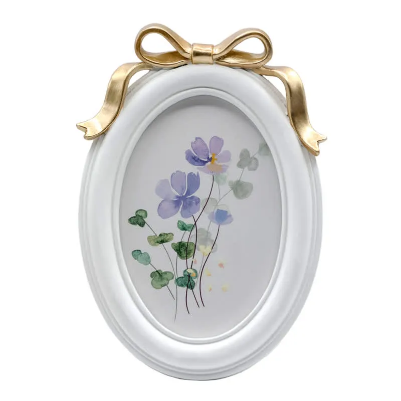 White Oval Picture Frame with Gold Bow made by Zulily