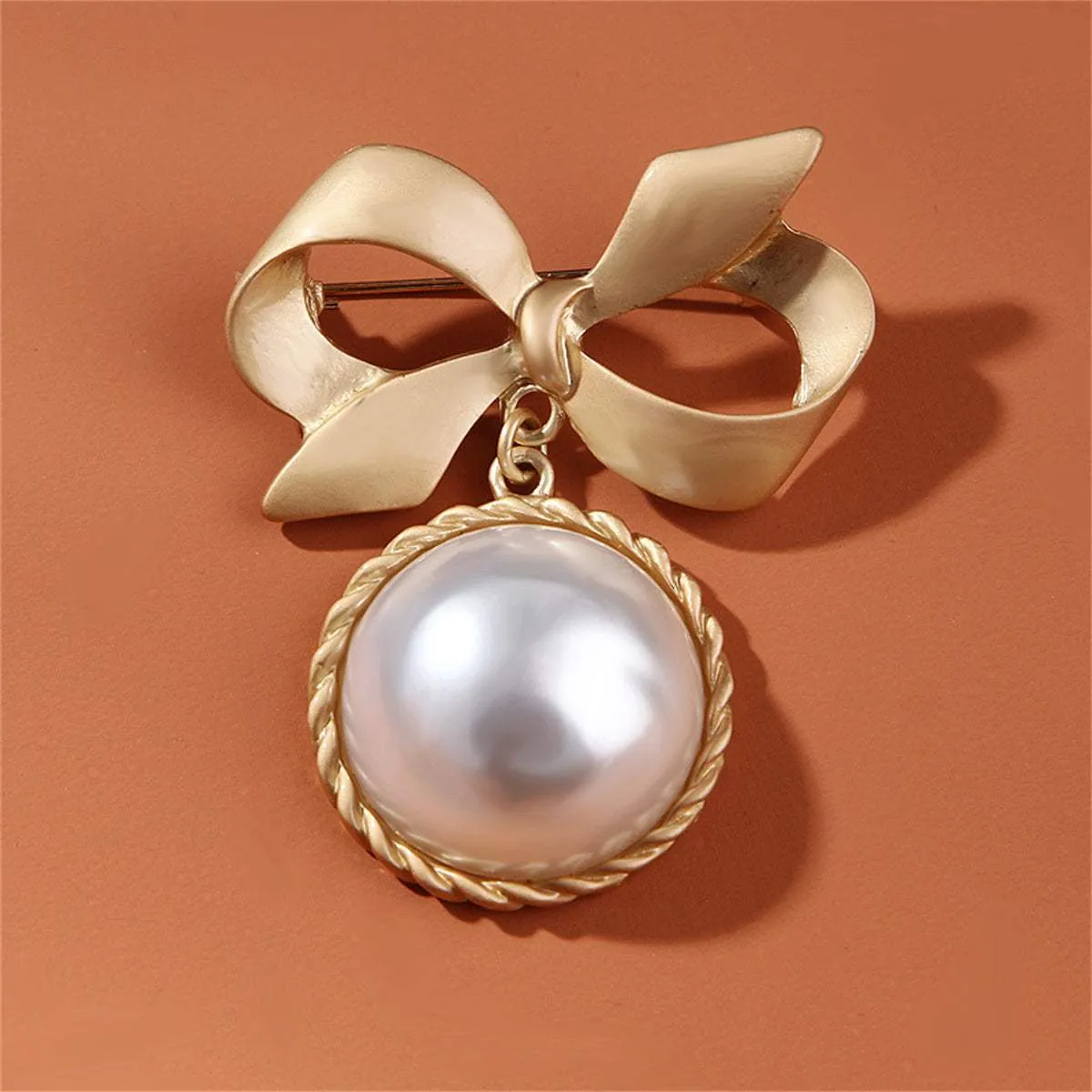 Pearl & Goldtone Bow Brooch sold by Zulily product image thumbnail 3