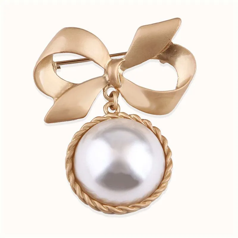 Pearl & Goldtone Bow Brooch made by Zulily