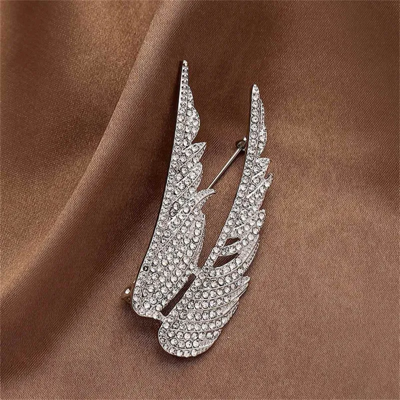 Cubic Zirconia & Silvertone Wings Brooch made by Zulily