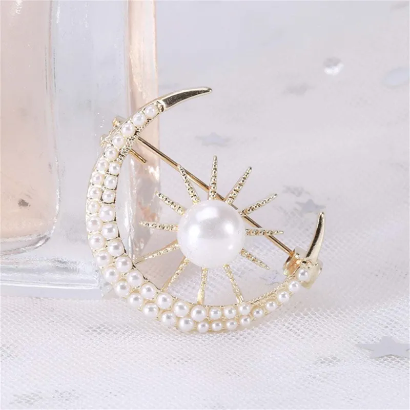 Pearl & Goldtone Sun & Moon Brooch made by Zulily