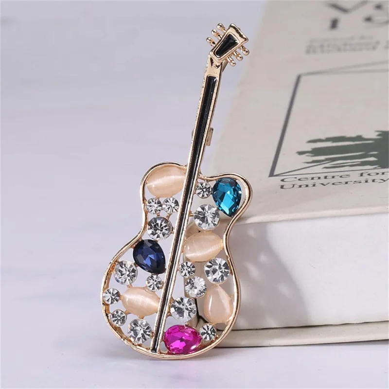 Cubic Zirconia & Peach Cats Eye Openwork Violin Brooch made by Zulily