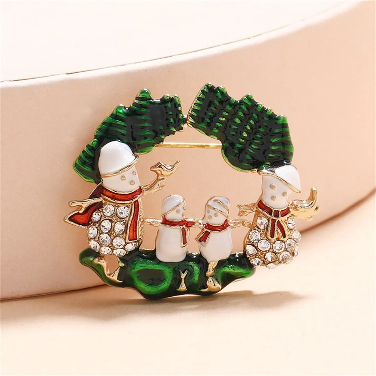 Cubic Zirconia & Green Snowman Family Brooch sold by Zulily