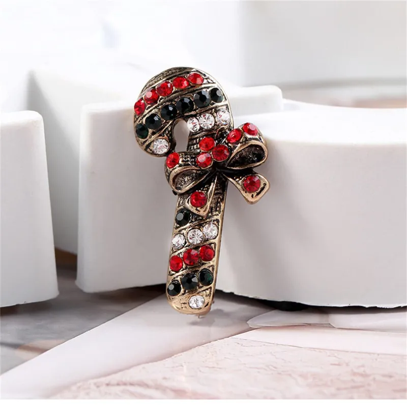 Black Cubic Zirconia & Goldtone Candy Cane Brooch made by Zulily