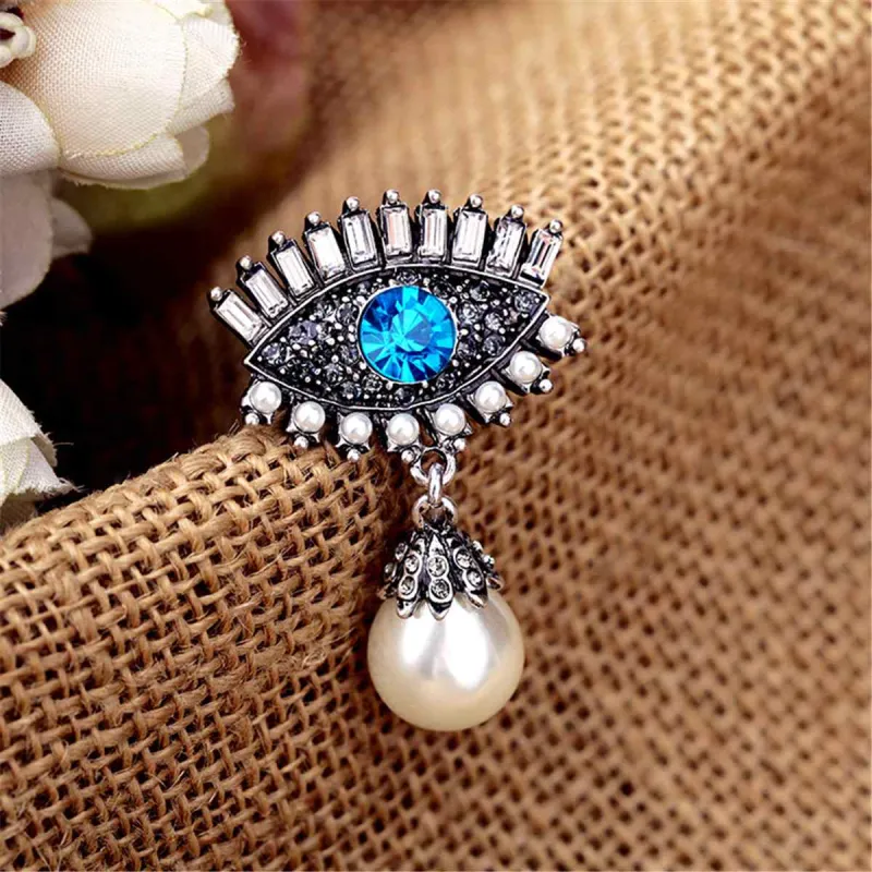Blue Crystal & Pearl Silvertone Eye & Drop Brooch made by Zulily