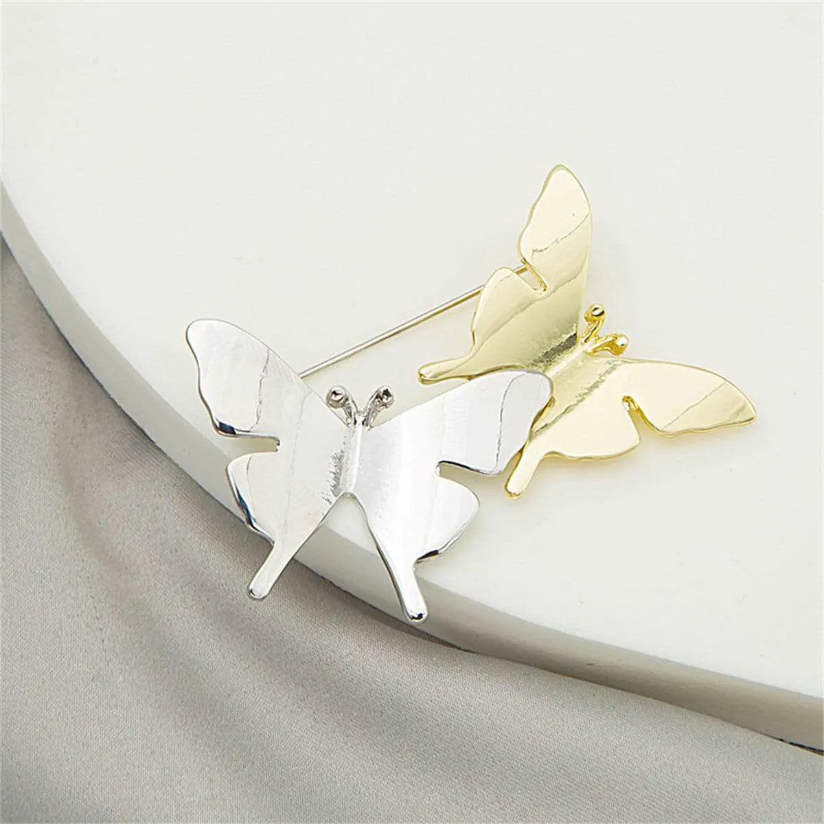 Two-tone Double Butterfly Brooch sold by Zulily product image thumbnail 3