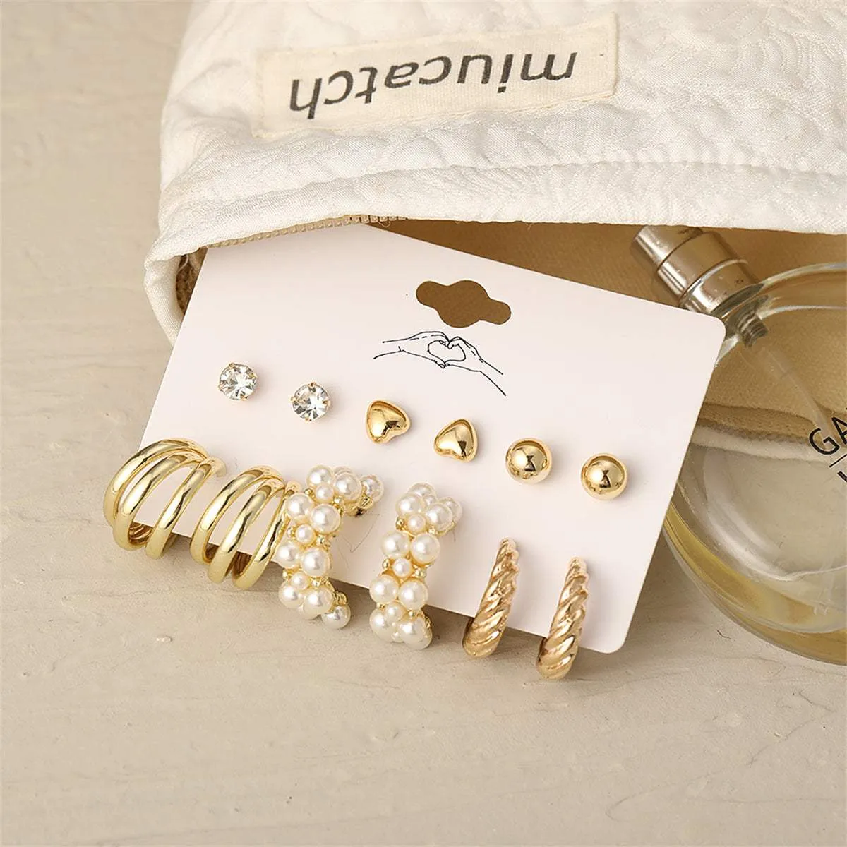 Pearl & Cubic Zirconia Goldtone Heart Huggie Earrings Set sold by Zulily