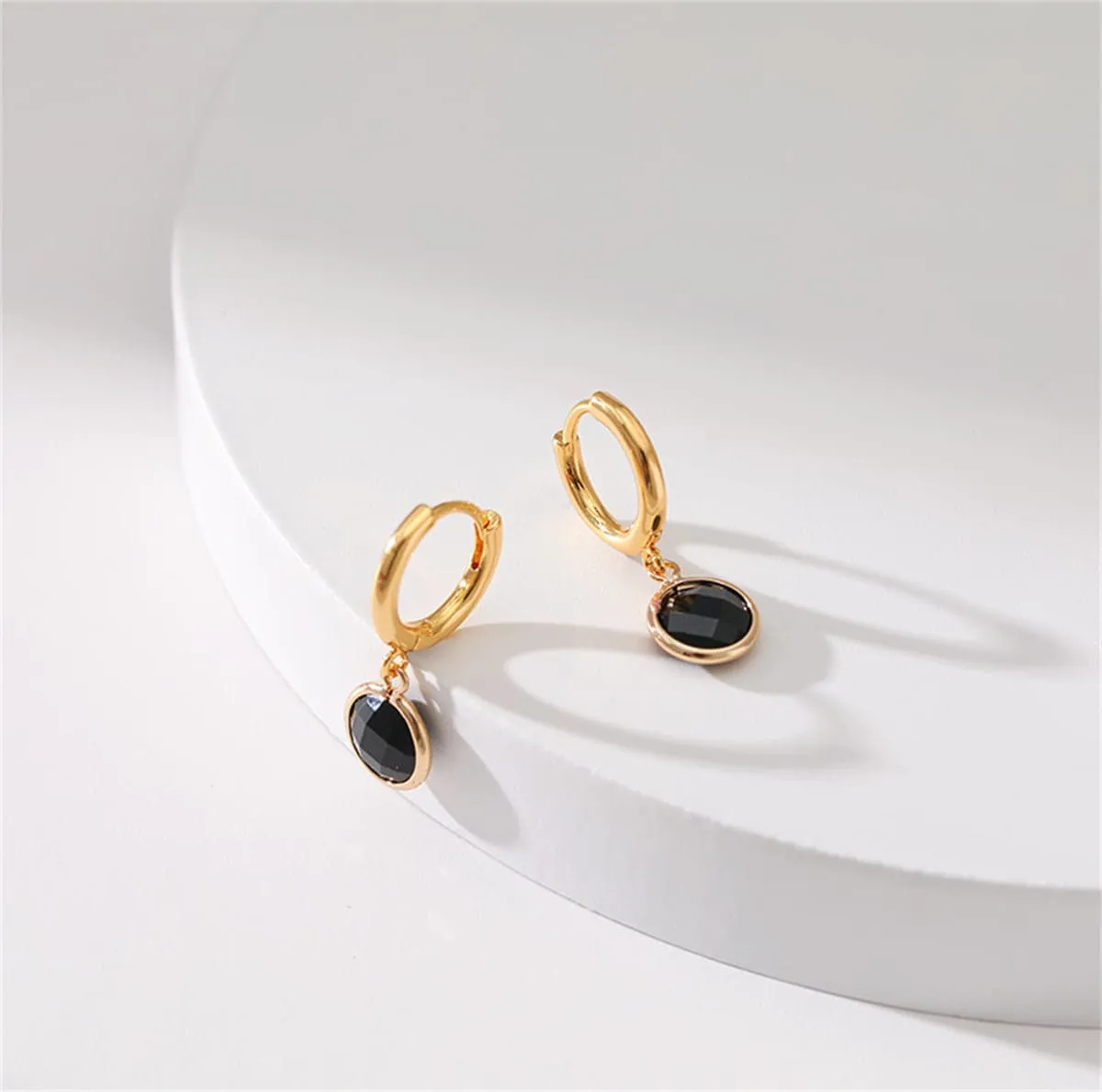Black Crystal & Goldtone Round Huggie Earrings sold by Zulily product image thumbnail 3