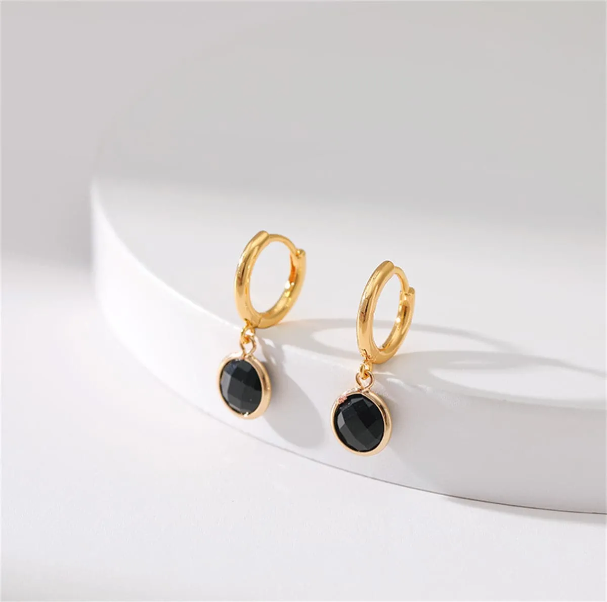 Black Crystal & Goldtone Round Huggie Earrings sold by Zulily product image thumbnail 2