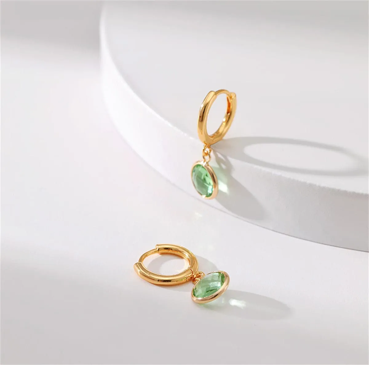 Light Green Crystal & Goldtone Round Huggie Earrings sold by Zulily product image thumbnail 3