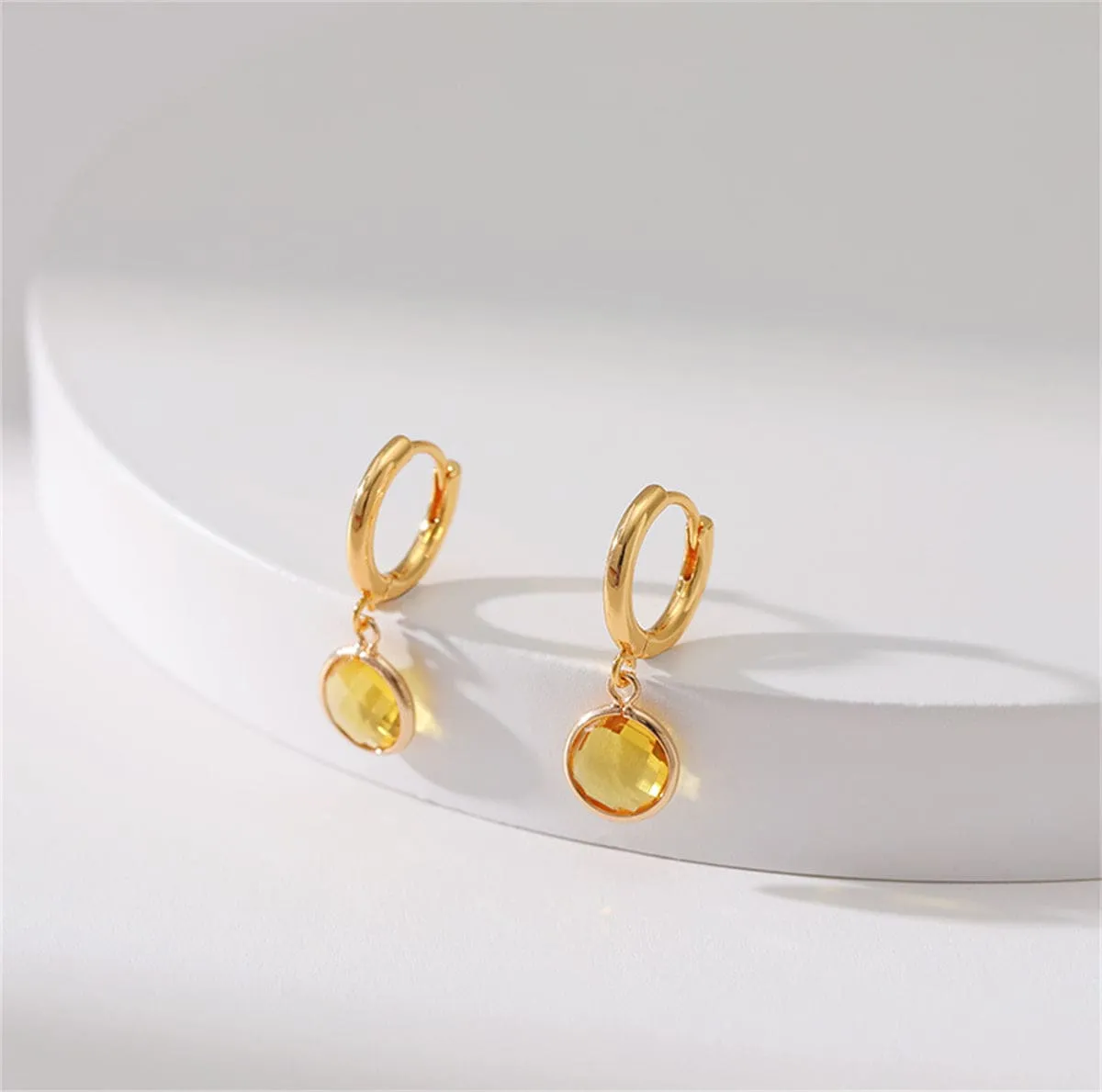 Yellow Crystal & Goldtone Round Huggie Earrings sold by Zulily product image thumbnail 2