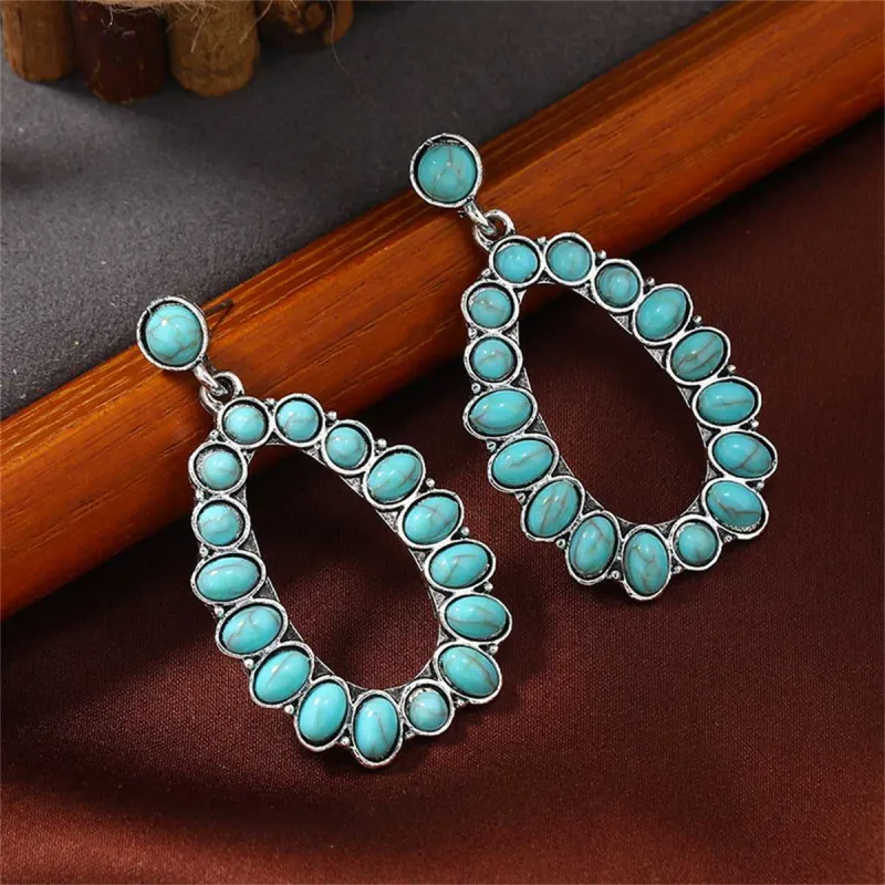 Turquoise & Silvertone Open Teardrop Earrings made by Zulily