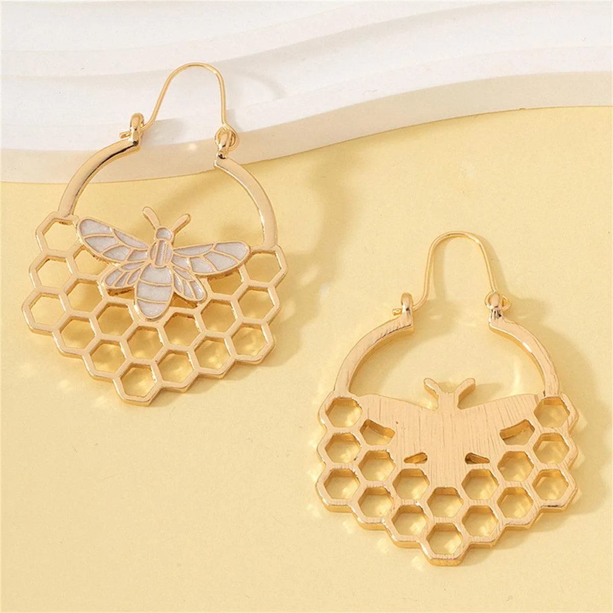 Goldtone Bee Honeycomb Drop Earrings sold by Zulily product image thumbnail 2