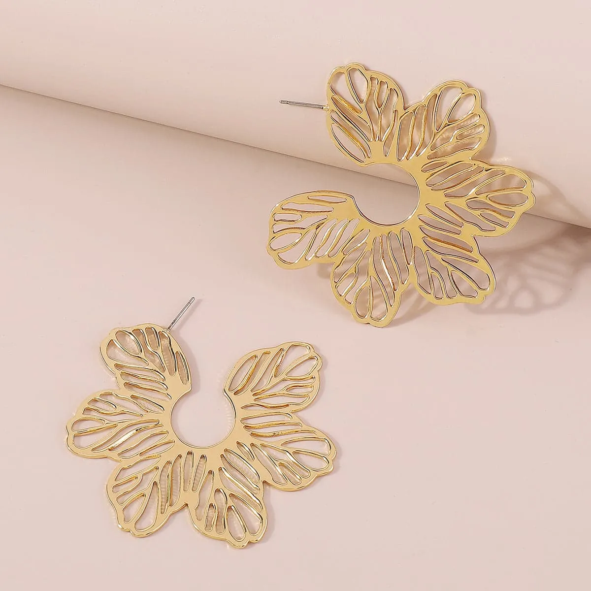 Goldtone Cutout Flower Huggie Earrings sold by Zulily product image thumbnail 3